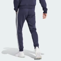 ADIDAS Essentials Fleece 3-Stripes Tapered Cuff Broek 9 ADIDAS Essentials Fleece 3-Stripes Tapered Cuff Broek -Regatta Verkoop essentials fleece 3 stripes tapered cuff broek 2